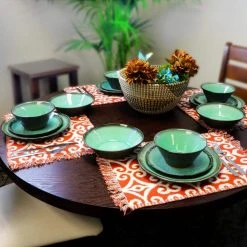 Green Lantern 16-Piece Contemporary Teal Terra Cotta Dinnerware Set (Service for 4) by GIBSON elite -Dinnerware Shop teal gibson elite dinnerware sets 985104944m 4f 1000